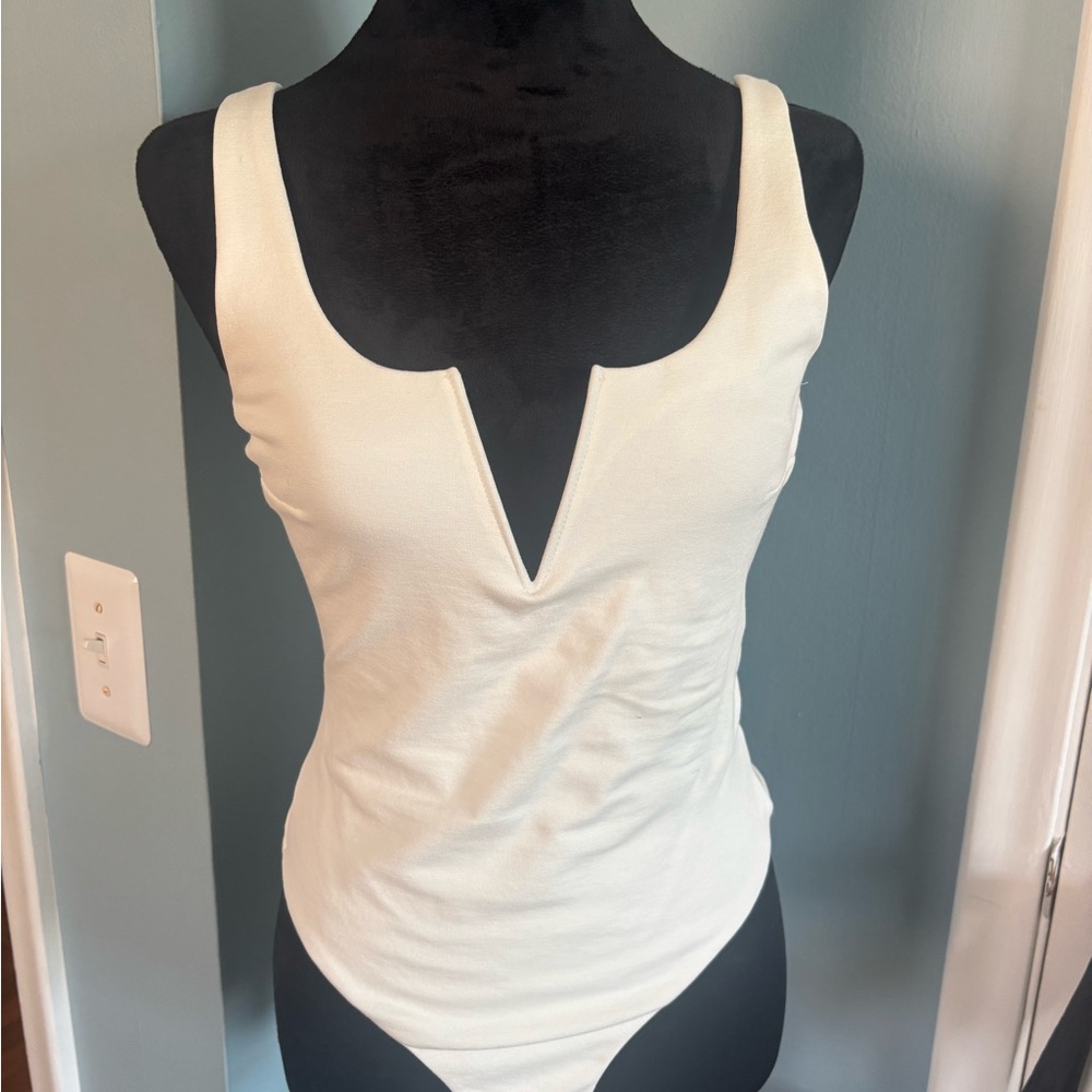 LULU’s Sleeveless V-Neck White Bodysuit Top